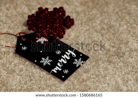 Glittery Christmas label holiday tag. Isolated Christmas gift tag.