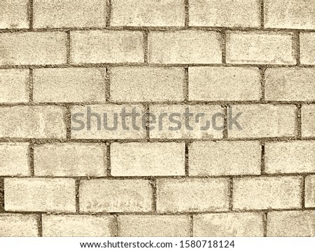 beautiful macro image with detail texture of brick wall under lighting in close up and minimal style so artistic masonry pattern for material object background