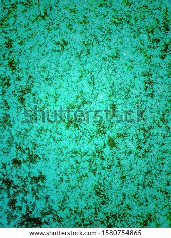 Aqua green background and black polka dots