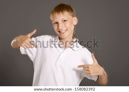 smile Teenage boy  on dark background