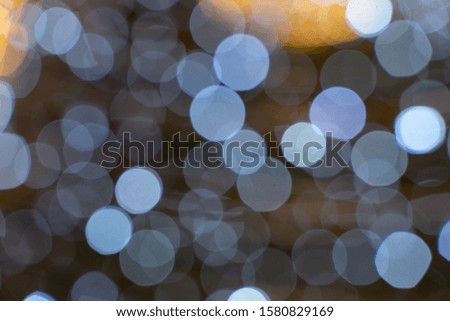bokeh of lights on black background ,abstract blue Bokeh circles for Christmas background,white bokeh on back background, pattern for festival.new year