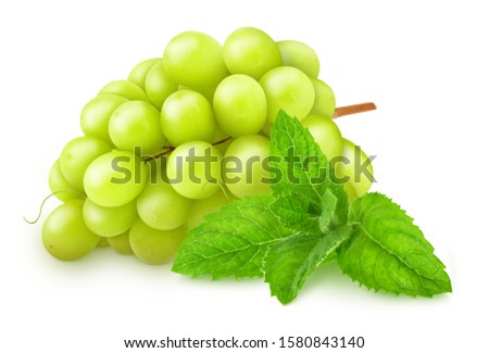 Composition with white juicy grape and sprig of mint isolated on a white background with clipping path.