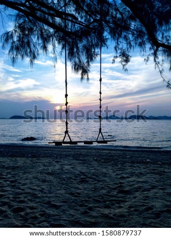sunset on Thailand beach evening Royalty-Free Stock Photo #1580879737
