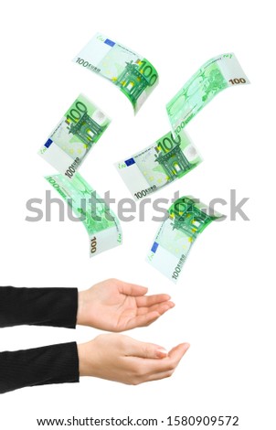 Hands and falling money isolated on white background
