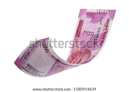 Indian currency on white background Royalty-Free Stock Photo #1580914639