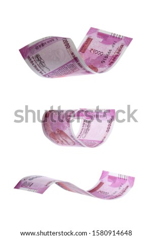 Indian currency on white background Royalty-Free Stock Photo #1580914648