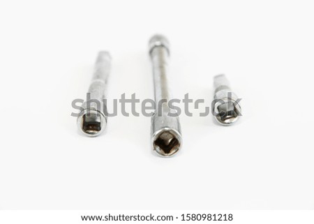 metal nozzles and screwdrivers with holes for tightening and a mounting