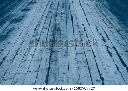 Natural wooden road with perspective in blue color. Front view with empty space. Copy space for adding your text or use for background.Wooden trendy color background closeup. Color of the year  2020