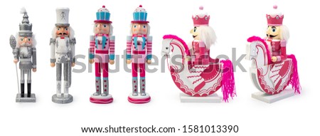 Traditional Figurine Christmas Nutcracker Wearing An Old Military Style Uniform on a horse isolated on white, Clipping path included 