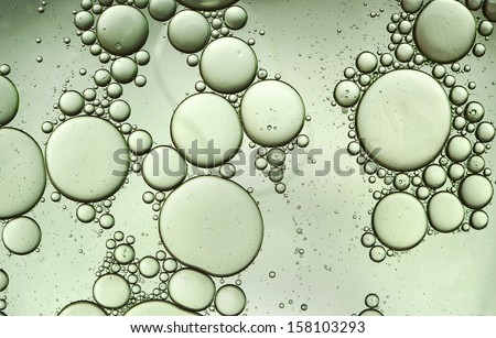 oil drops on water Royalty-Free Stock Photo #158103293