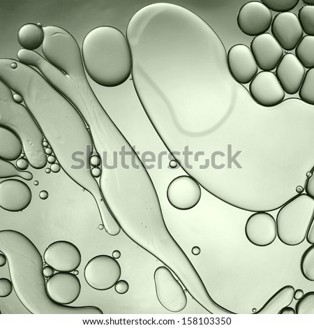 oil drops on water Royalty-Free Stock Photo #158103350