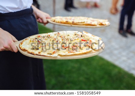 freshly made pizza at a party