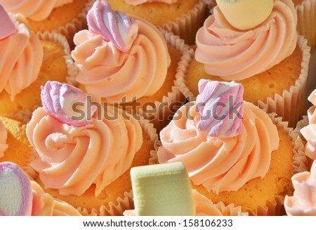Cupcake's with pink swirl sugar butter icing frosting stock photo, stock, photograph, image, picture 