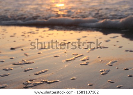 sunset reflection on ocean waves