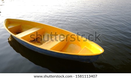 Yellow boat in the lake