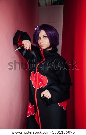 Beautiful woman anime cosplayer with purple hair Japan