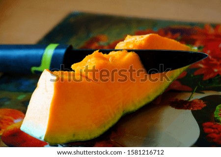Photo of a cut melon on the table. Vegetables close up. Salad for vegetarians.