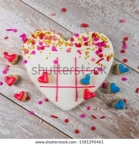 Closeup of valentines day heart tic-tac-toe