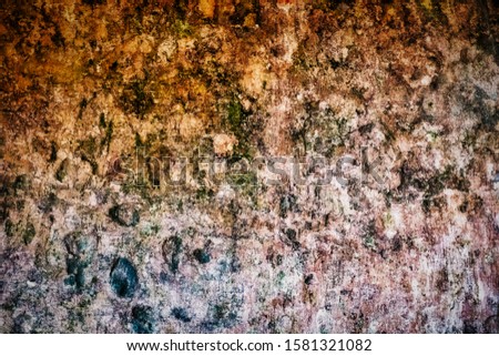 Years of patina and grime on an ancient monastery wall in Sintra Portugal