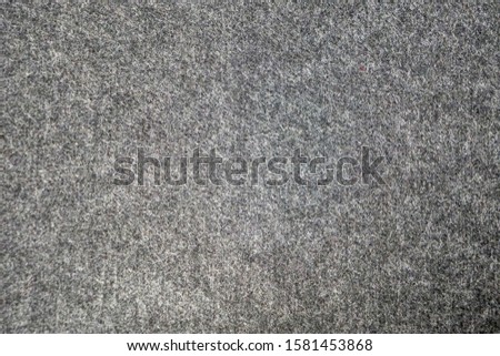 gray black felt background, soft fabric, pleasant to the touch, wallpaper                               