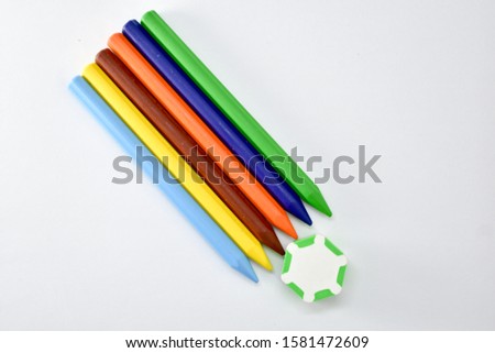 colour ful cryons pencils and eraser