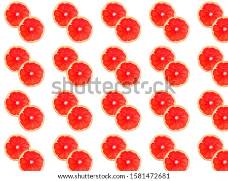 Seamless photo pattern of grapefruit slices on a white background. Seamless pattern for your design.