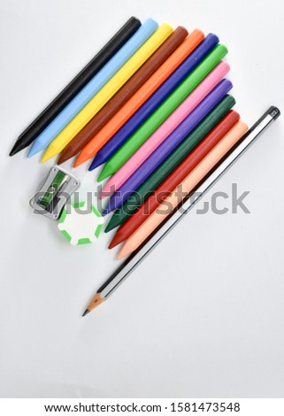 colourful cryons pencils ,eraser and sharpner