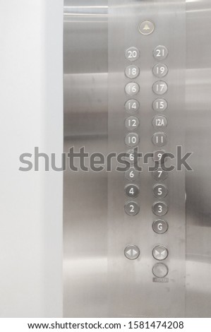 Elevator button up and down in various floors Inside the building