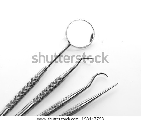 Basic dentist tools isolated on white
