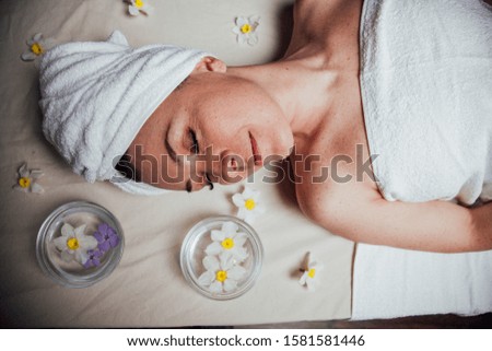 the beautiful girl lying in Spa massage sauna Royalty-Free Stock Photo #1581581446