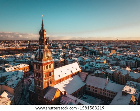 Aerial View of Riga old town. First snow sunrise.