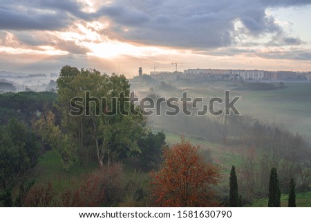 Image of morning fog in the early dawn hours in Rome, Italy