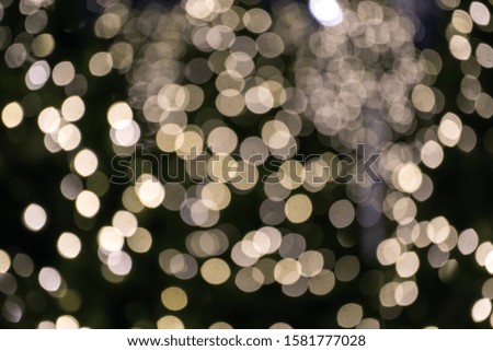 The bokeh pictures were orange, white, and blue from the lights of the New Year's decorations