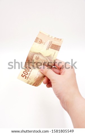 Indonesian Rupiah - official currency of Indonesia
 Royalty-Free Stock Photo #1581805549