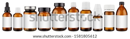 Set collection row of various brown medicine pill glass pipette dropper bottle with blank copyspace label design pattern isolated on white panorama background Royalty-Free Stock Photo #1581805612