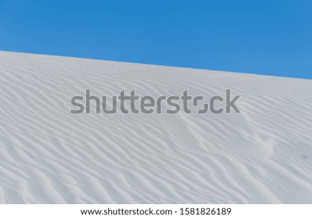 Low angle landscape of ripples in the dunes at White Sands National Park in New Mexico