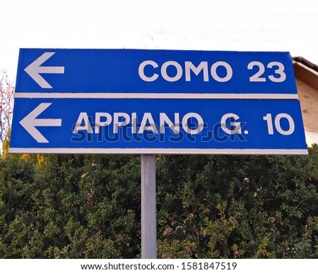 Italy: Road signal  (directions and information: Como City and Appiano Gentile Village).