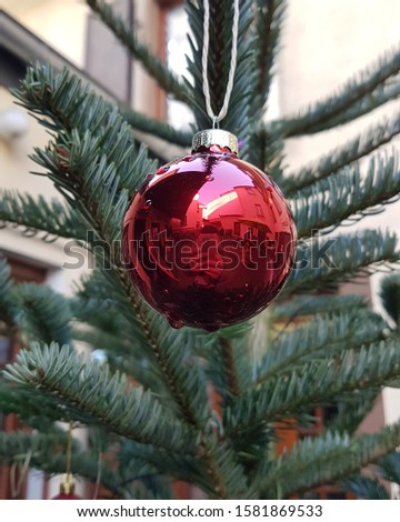Selfie taken on a Christmas tree ornament 