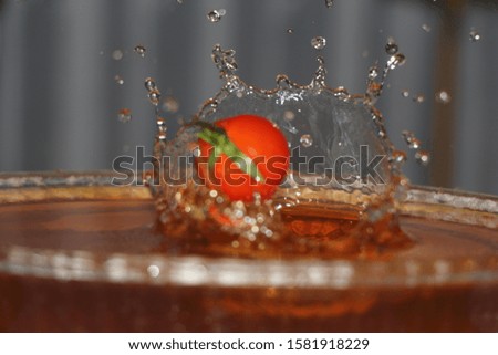 Dance of a tomato in harmony with water.