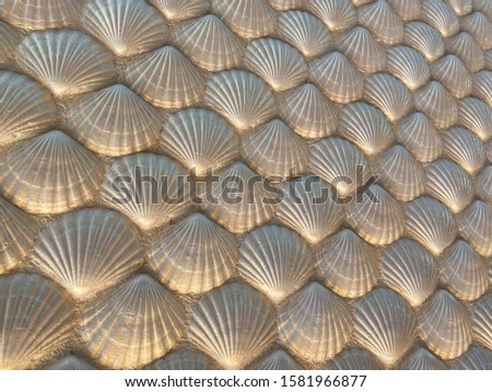 A shell pattern background that was used on a cruise ship as a ceiling.