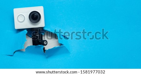 Action camera isolated. Action-cam for video footage. Media concept. Communication with digital video.
