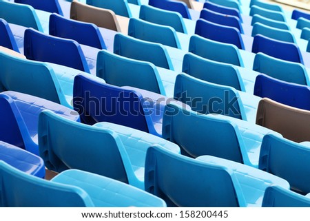 Blue plastic seat in stadium