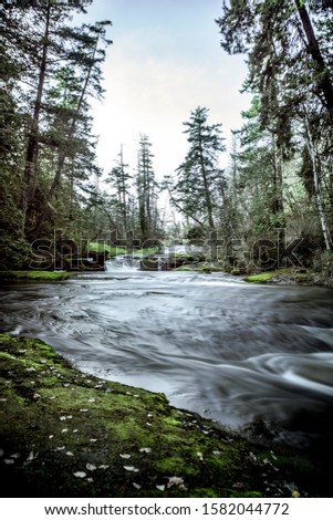30 seconds Long exposure water of cascading Millstone River, Vancouver island. 