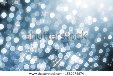 Christmas blurred background decorated with bokeh lights and snowflakes. For the computer screen image
beautiful
