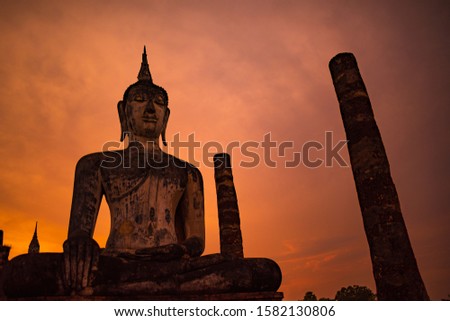 Buddha image at Wat Mahathat in Sukhothai Historical Park, Thailand. Buddha statue used as amulets of Buddhism religion.