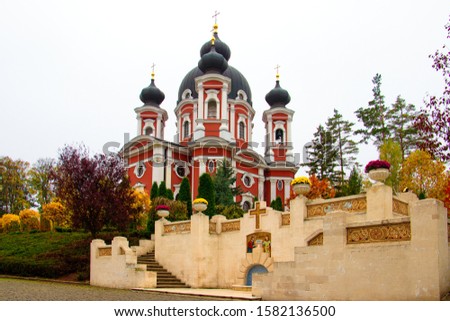 A low angle shot of the famous Curchi Monastery in Moldova behind its beautiful gates