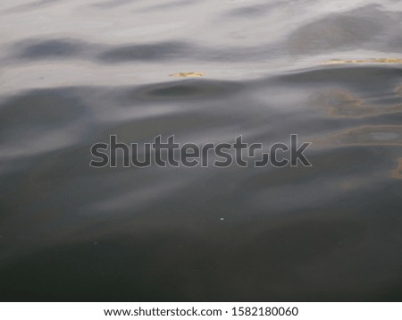 black Tones Water Waves Surface as Background