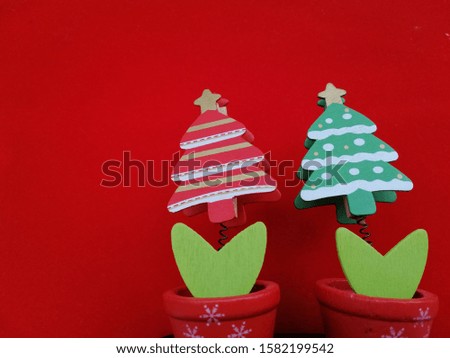 Christmas decoration over red background  