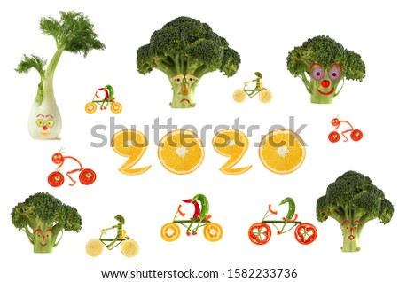 Healthy eating. Little funny people made of vegetables and fruits.
