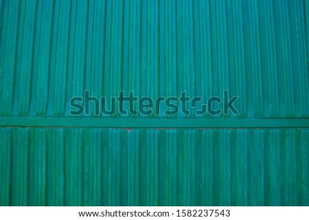 Rusty metal texture, green metallic door background, rough grungy texture